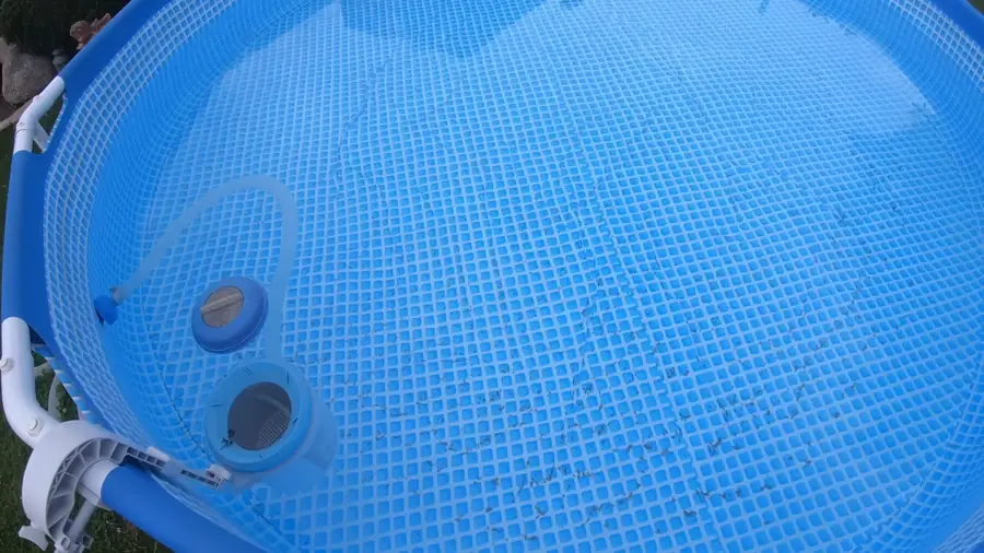above ground pool frame and liner inspection in a Pinery backyard