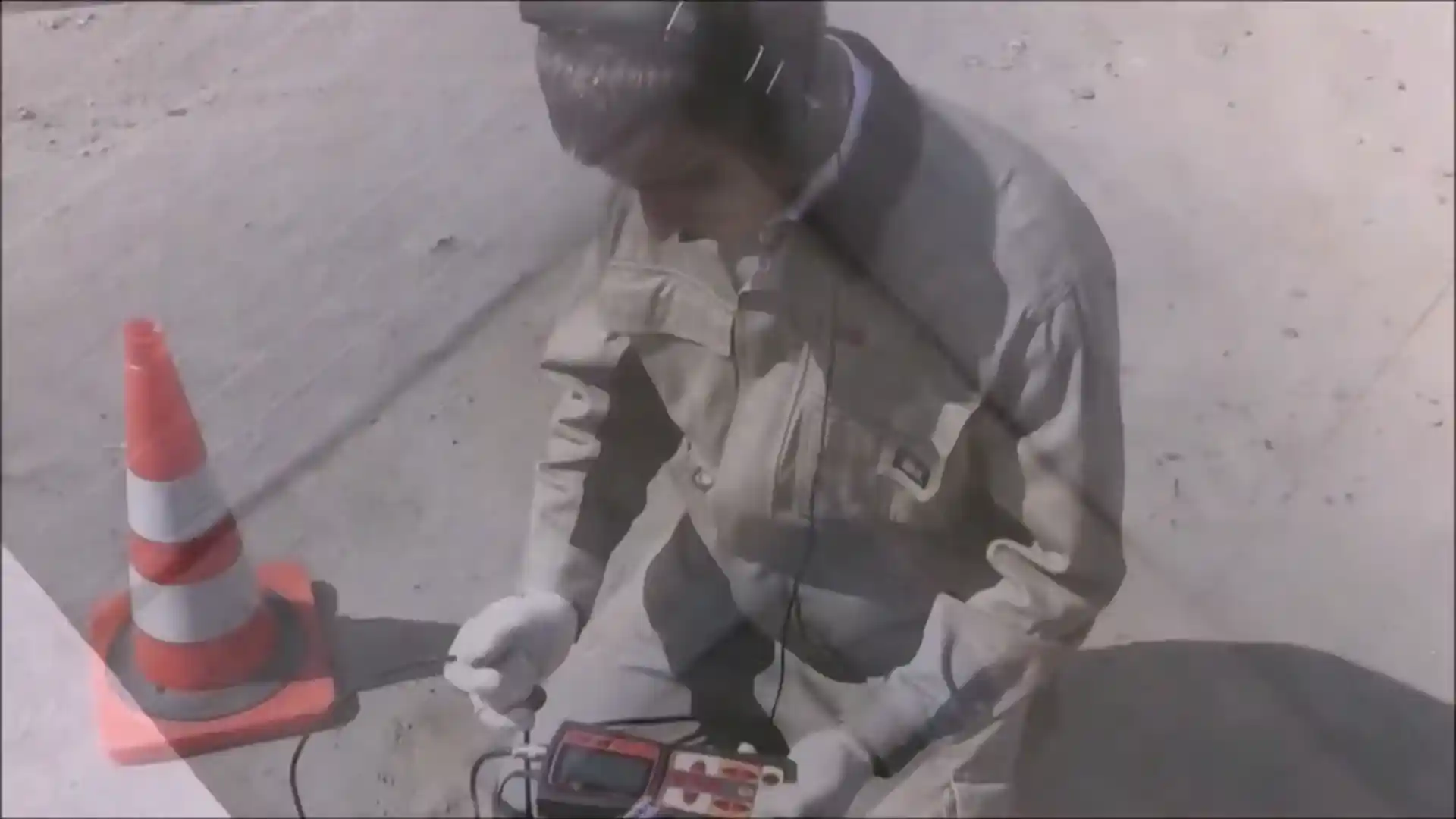 ground microphone listening on a driveway above a suspected supply line in Stonegate
