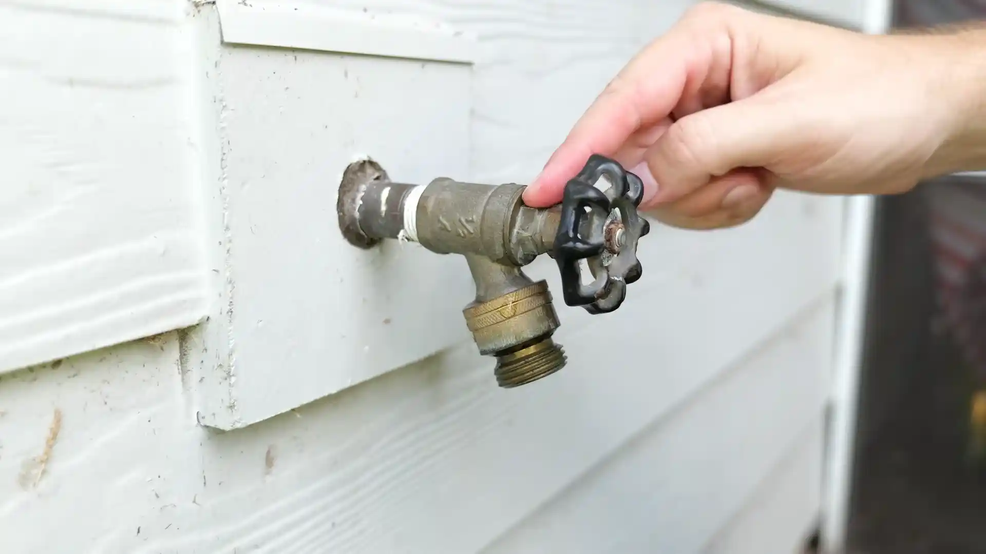 kitchen faucet cartridge being inspected at a Hilltop Parker home