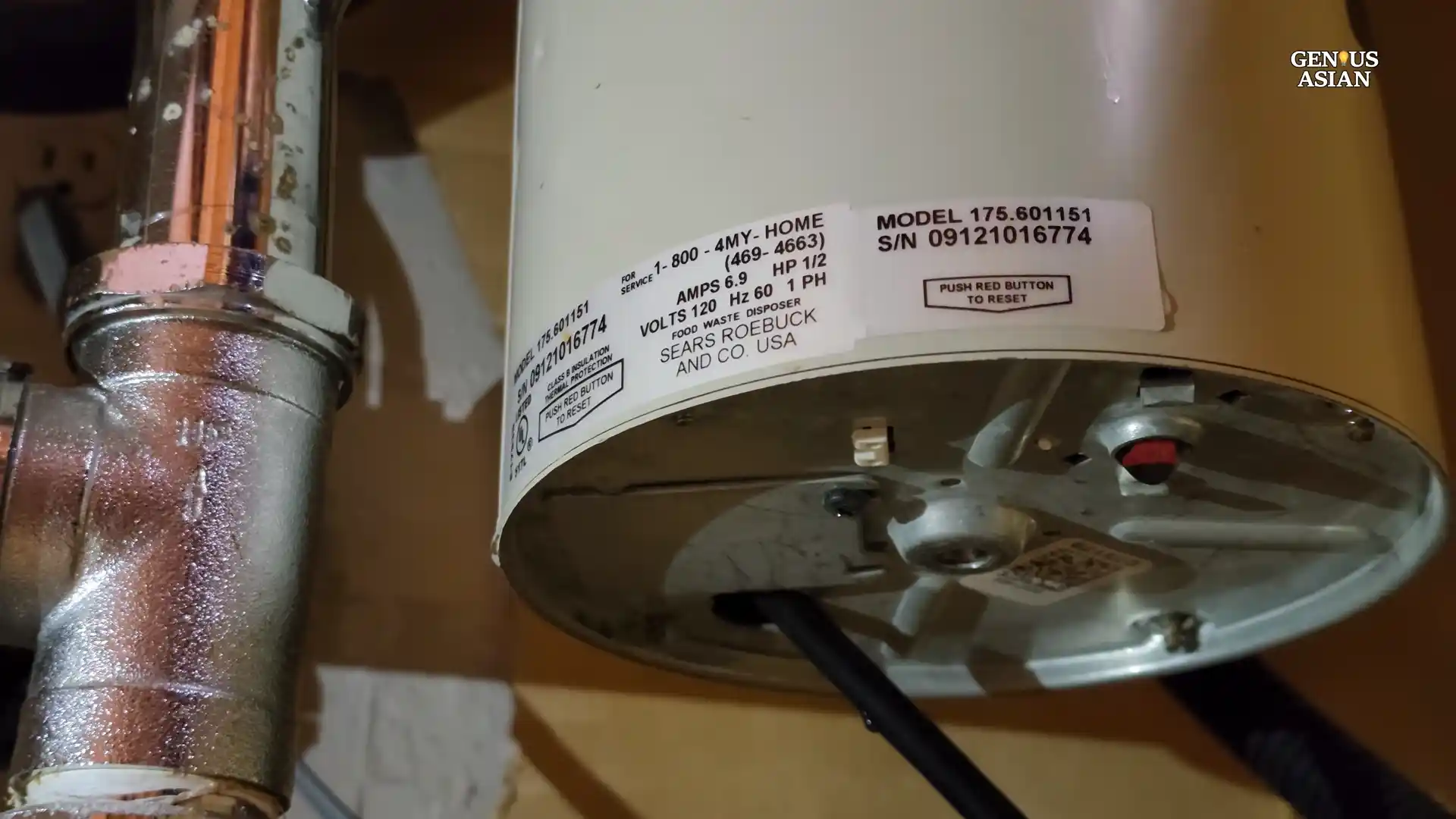 garbage disposal mounting flange inspection from below in a Cottonwood Parker kitchen
