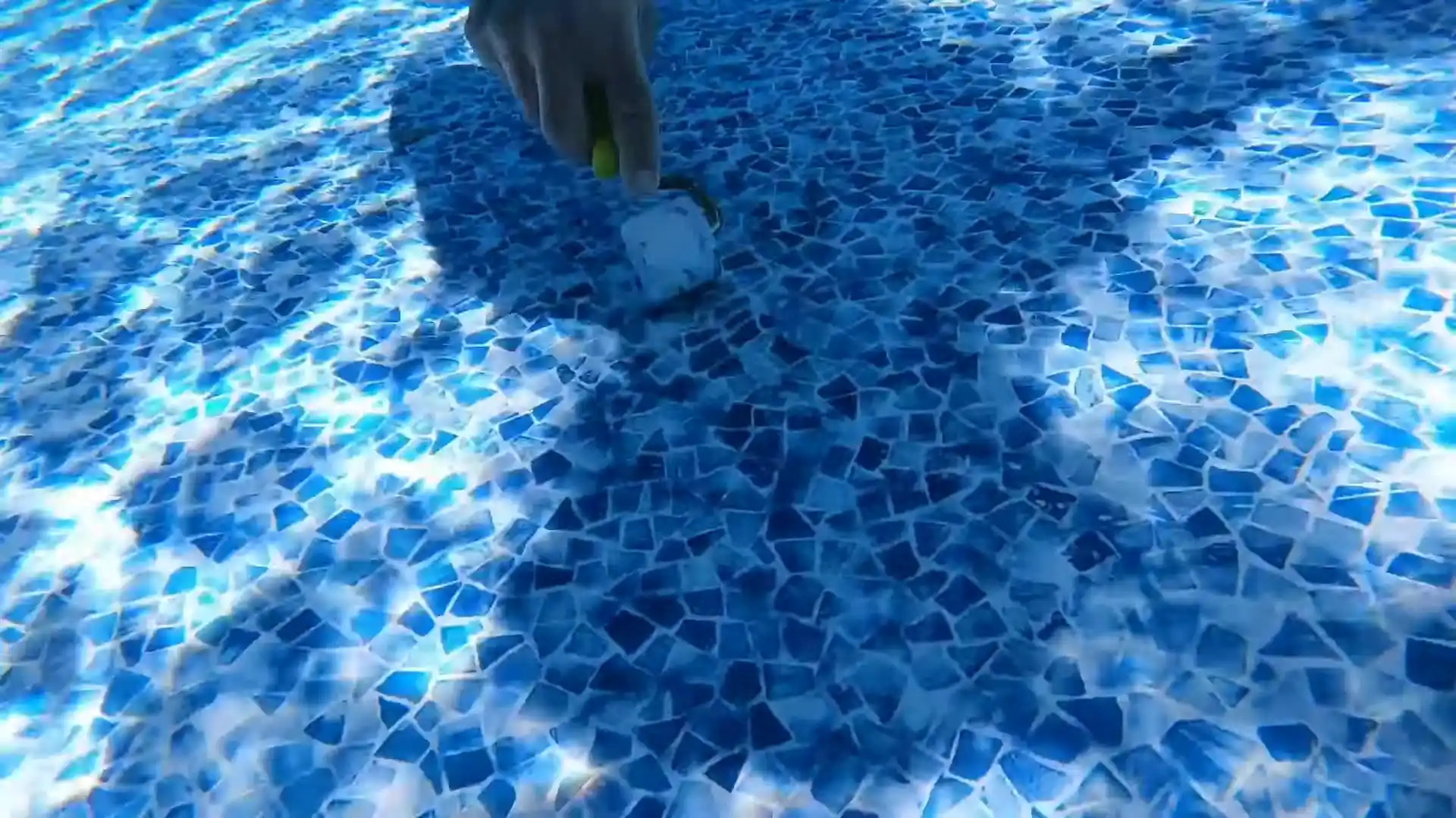 leak detection technician at a Parker backyard pool with pressure gauges