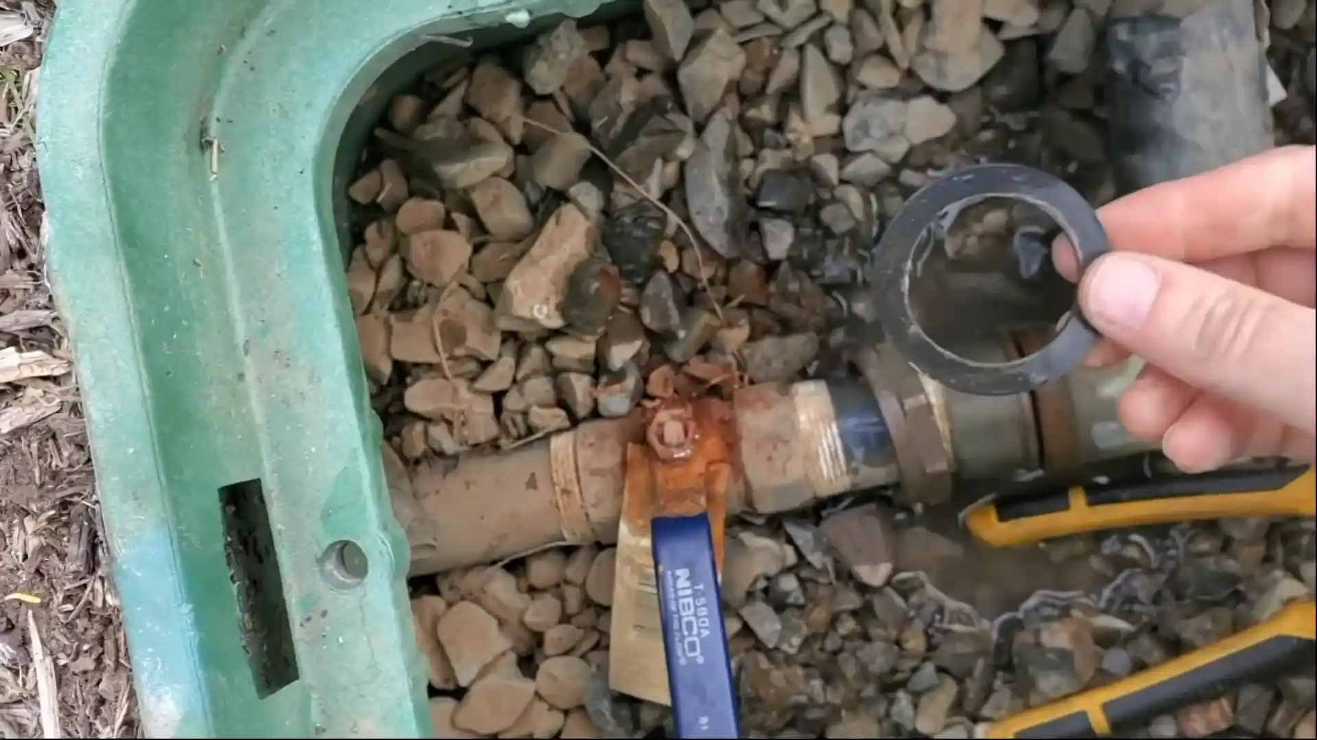 irrigation valve box being inspected on a Reata Ridge large lot